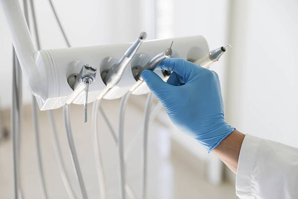 Professional Tooth Extraction technician working in Oak Ridge, NC